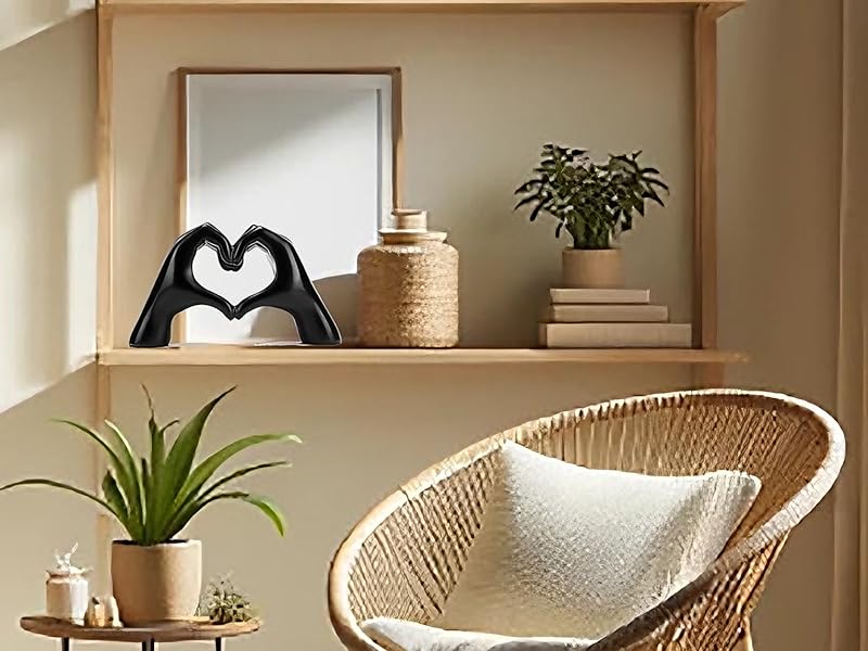 Medium Heart Hand Statue on Shelf