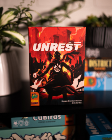 unrest card game for kids and adults dystopian strategy game for family game night pandasaurus