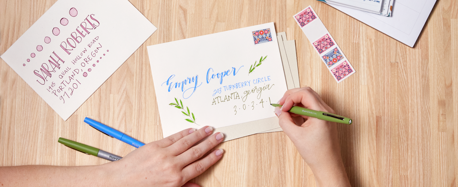 hand writing desk wood table letters invites colorful party flair paper mate stamps office school