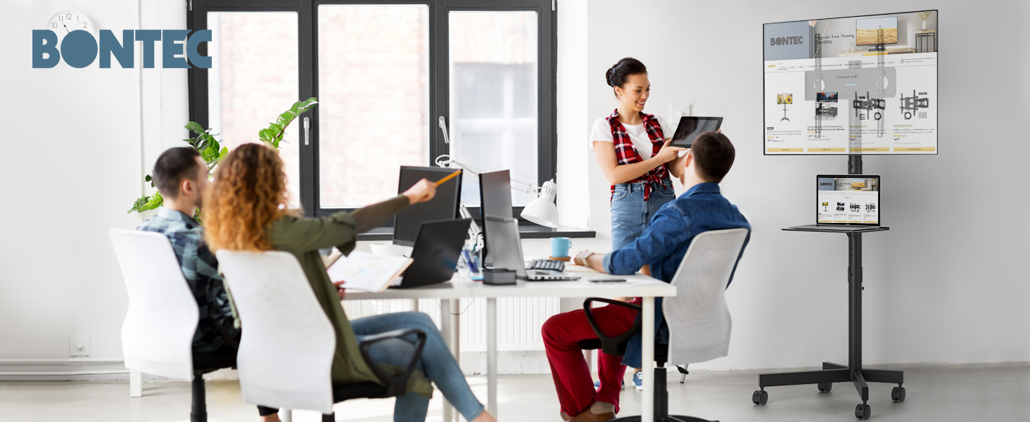 a group of people working in an office