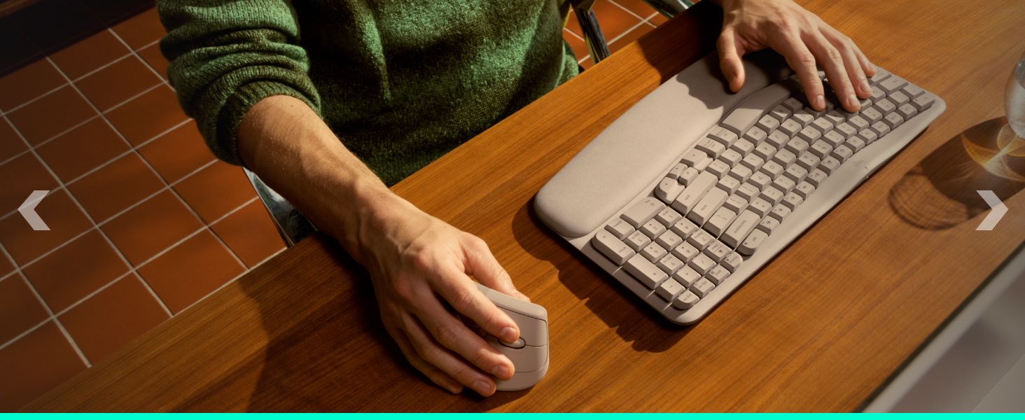 a person using a keyboard and a mouse