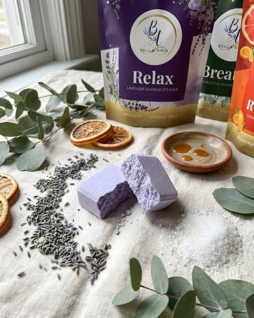 Lavender shower steamers with natural ingredients, essential oils, and botanical elements
