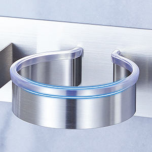 Close-up views of a curved metallic wall sconce with sleek, modern design showing brushed aluminum finish and gentle curved shape for indirect lighting.