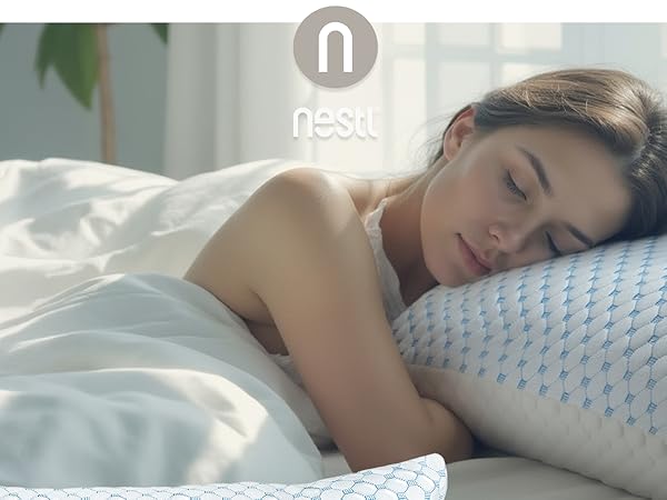 Woman sleeping on Nestl cooling pillow