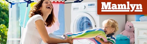 Mother showing child how to turn knobs on washing machine with red Mamlyn logo in top right corner