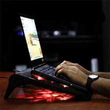 hands typing on laptop