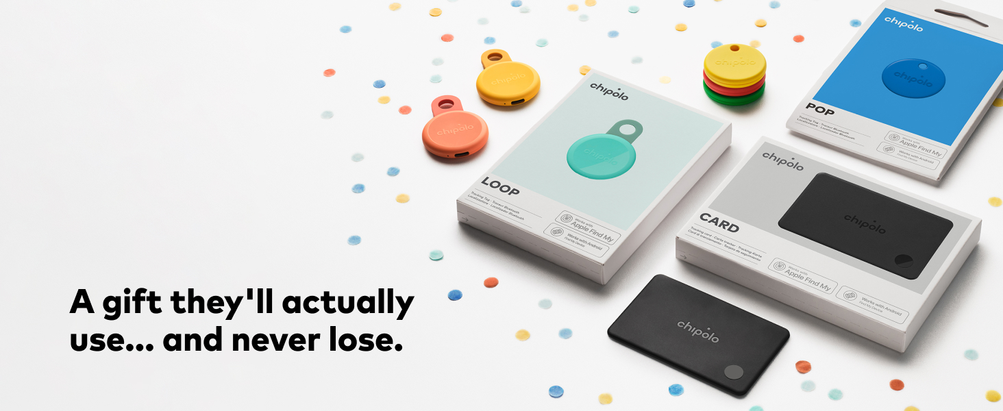 Text reads 'A gift they'll actually use... and never lose.' Flat lay of colorful small round objects, white device holders, and blue notebook scattered with confetti on white background.