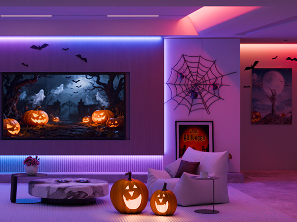 Halloween-themed room decoration collection showing purple LED lighting, silhouette cutouts, and illuminated jack-o'-lanterns creating spooky ambiance.