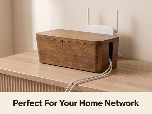 Mango wood cable box by a wifi router holding its adapters, cords out the slot