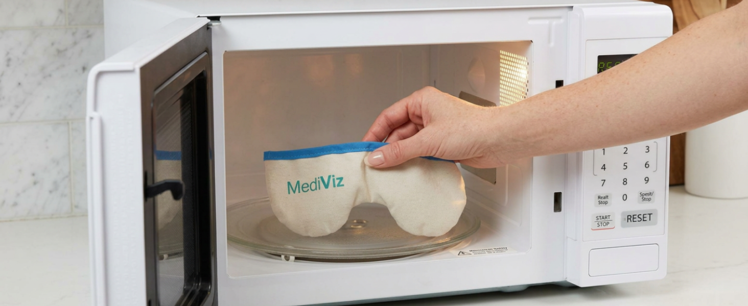 Woman placing mask insert into microwave