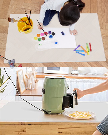 Lifestyle photos showing hands working at a desk with art supplies, including watercolors, brushes, and paper, demonstrating creative process.