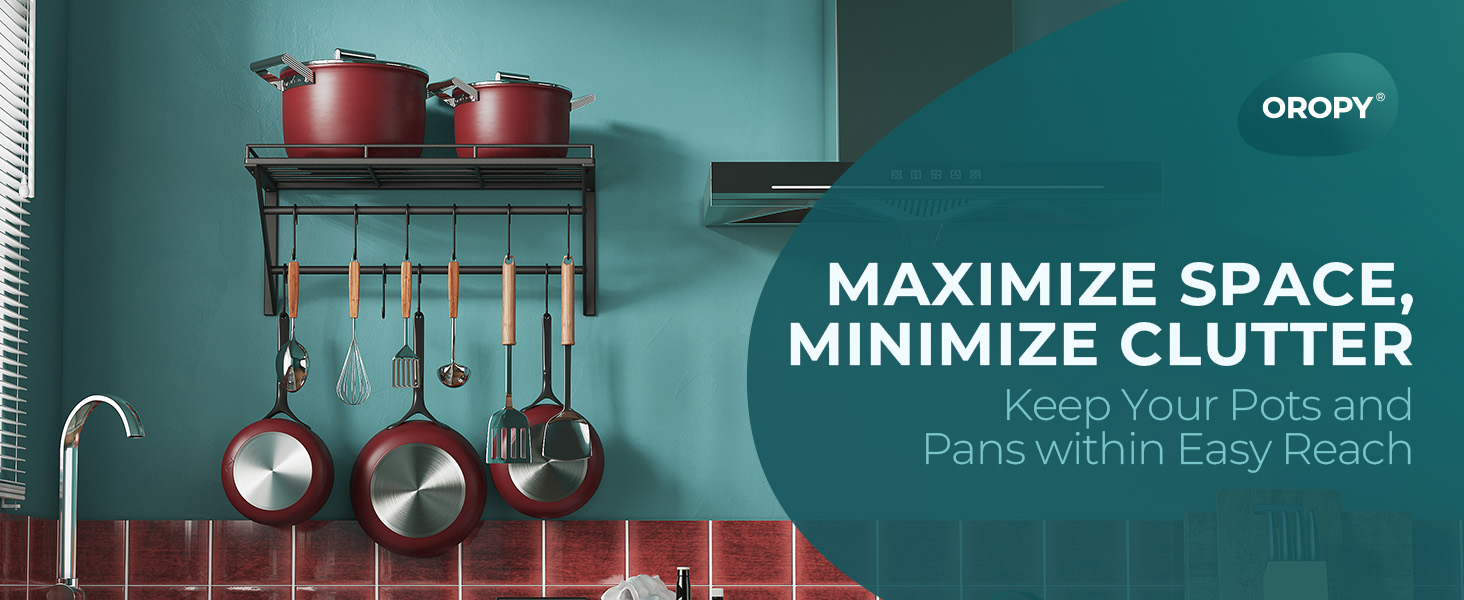a kitchen with a red wall and a blue background with a pot rack and pans.