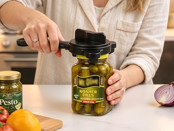 Mechanical jar opening tool with steel clamps for stuck lids, vacuum seals and large jar caps.