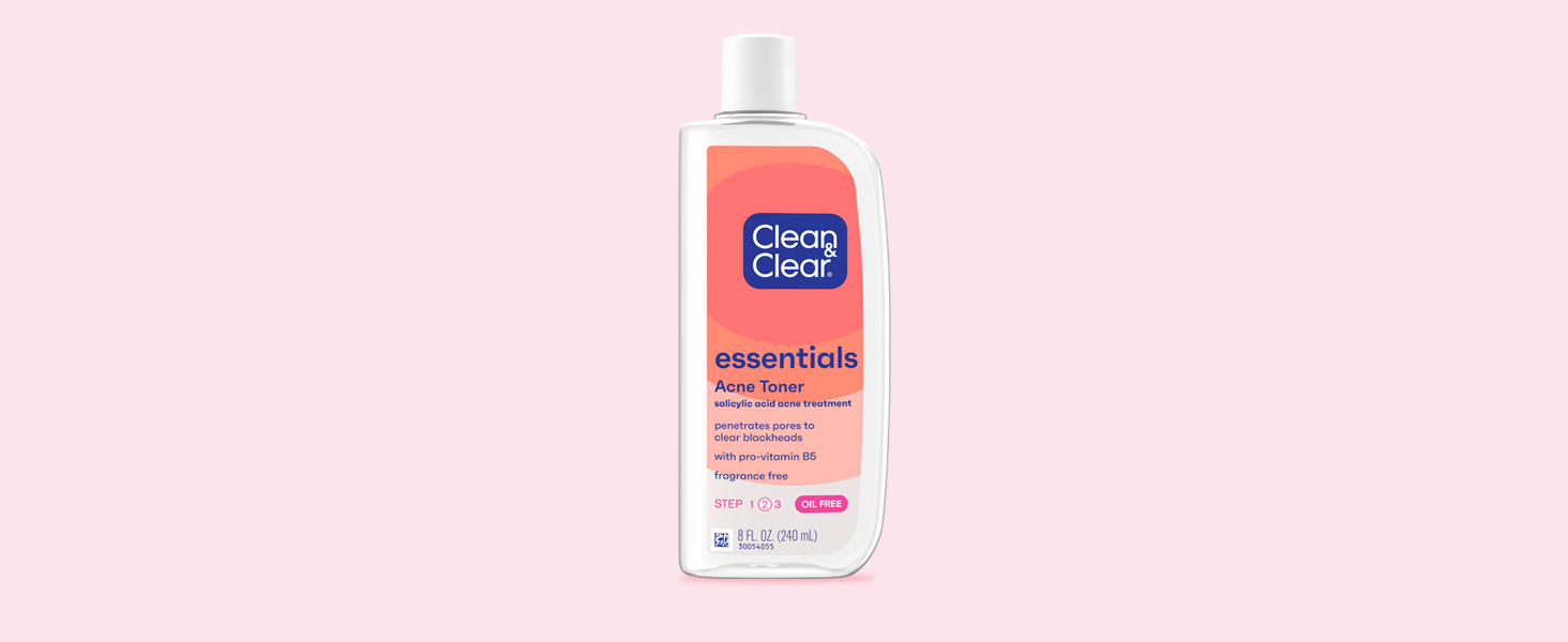 bottle of Clean & Clear Essentials Acne Toner on coral colored background