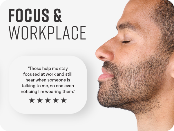 Man with peaceful and focused expression wearing invisible ear plugs to reduce noise