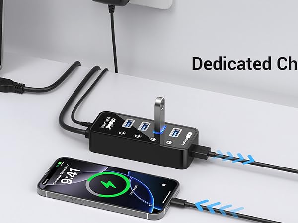 Dedicated charging port to charge your phone while using the other ports