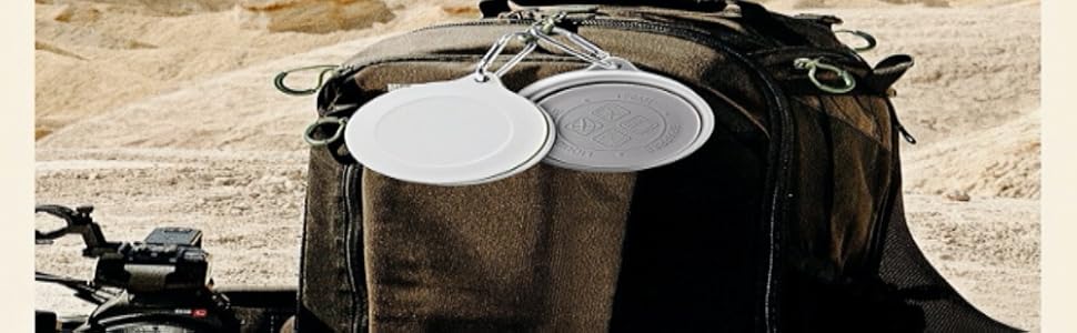 Collapsible water bottle on backpack