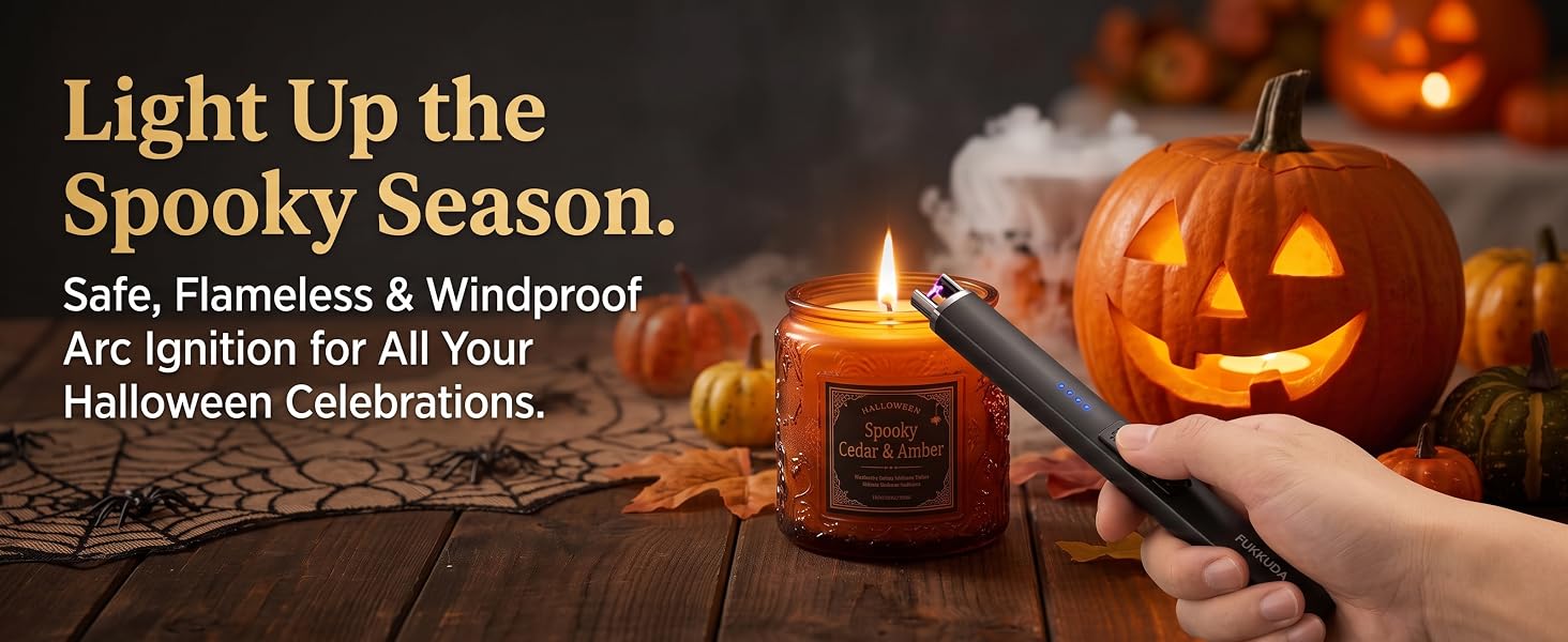 Hand holding a FUKKUDA electric arc lighter to ignite a candle inside a carved Halloween pumpkin