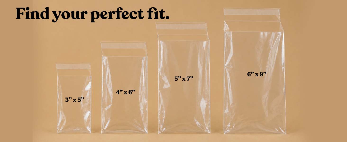 Four empty clear self-seal cello bags in 3x5, 4x6, 5x7, and 6x9 inch sizes