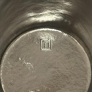 KOYASU titanium tumbler interior with TI logo. Uncoated 1668C crystallized metal, zero coatings.