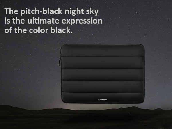 Black puffy laptop sleeve