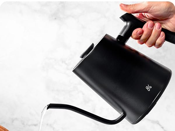 hand tipping the greater goods gooseneck kettle pouring water