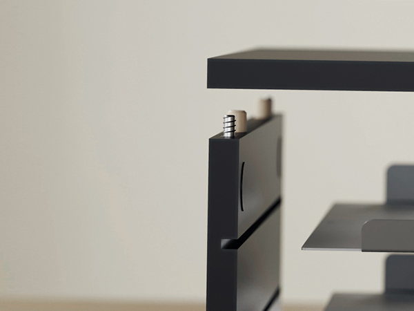 Attach the frame, apply pads and place the metal shelves—one person builds desk riser in just 5 min.