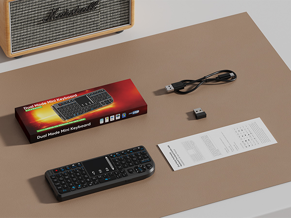 Package Contents: Mini keyboard, instruction manual, charging cable, receiver