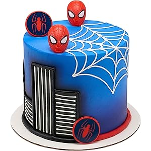 Spider-man cupcake rings on blue spidy cake