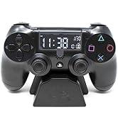 Black gaming controller alarm clock display stand showing digital time interface with PlayStation button symbols.