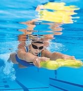 athlete training in the swimming pool with a kickboard pull kick 2in 1 training tool