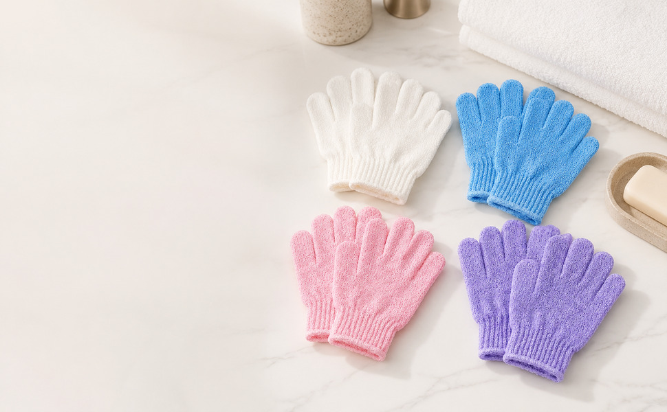 Four pairs of colorful ATB exfoliating gloves arranged beside a shower setting