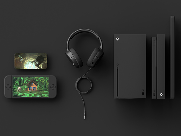 - Arctis 1 with a laptop, Nintendo Switch, console controllers, phone, and two cables
