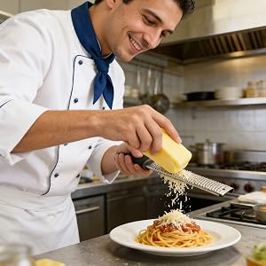 Multi-purpose kitchen grater with non-slip ergonomic handle.