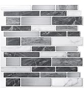 Peel-and-stick wall tiles with a gray, white, and black marble-like pattern. Rectangular tiles of varying sizes create a modern brick layout design.