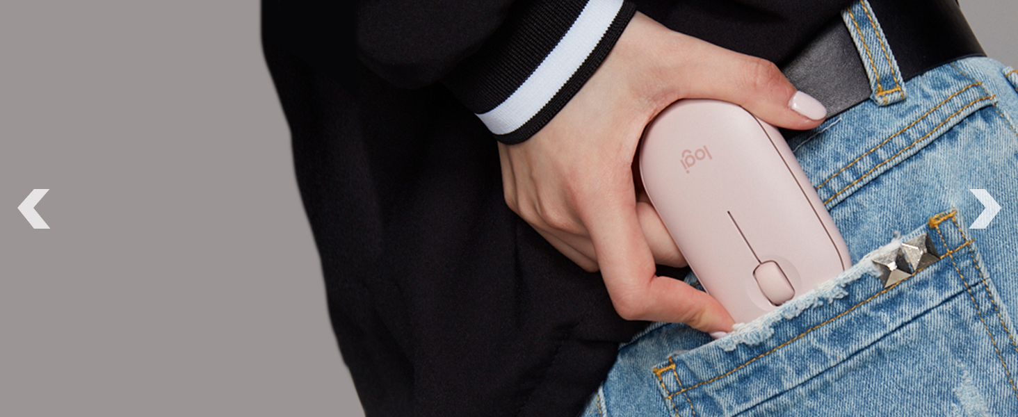 a woman putting m350 rose wireless compact mouse in her pocket