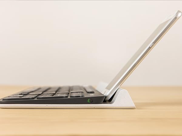 Integrated rubber cradle holds mobile devices