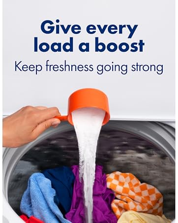 Pouring baking soda into wash titled "Give Every Load a Boost Keep Freshness going strong"