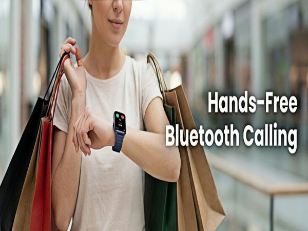 Woman checking heart rate monitor on pink smart watch.