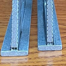 close up of the fence/base/foot of the speed squares - shows they're great as a saw guide