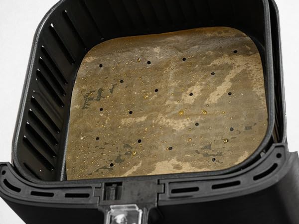 The brown parchment paper liners catch most food drippings in your basket