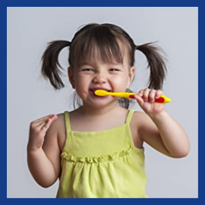 Small child brushing teeth