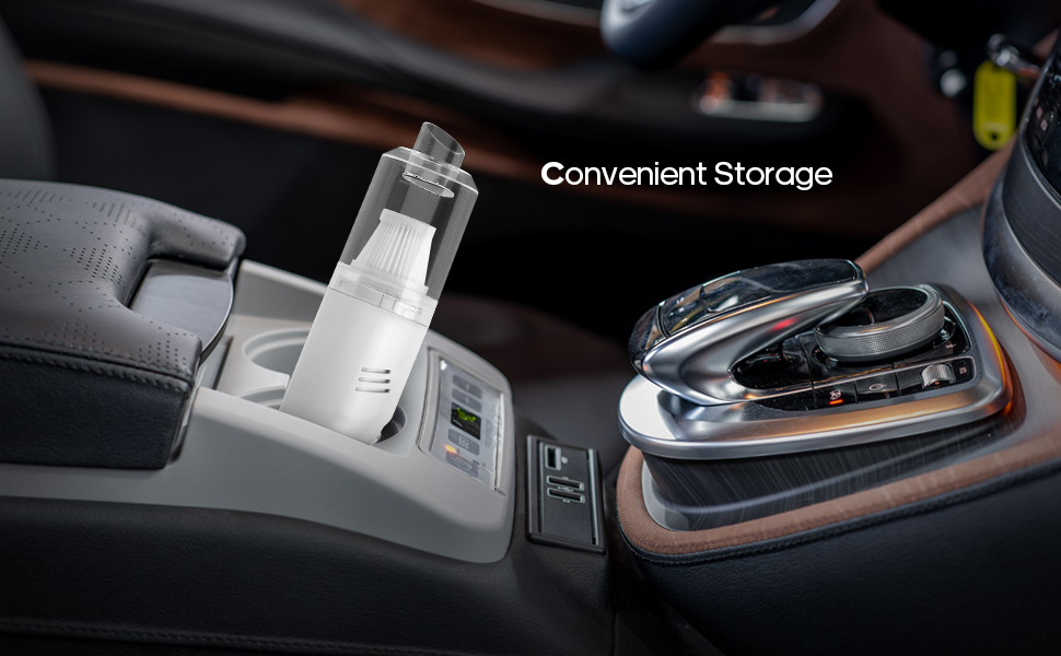 Car interior showing center console with cup holder containing a water bottle. Text overlay reads 'Convenient Storage'.