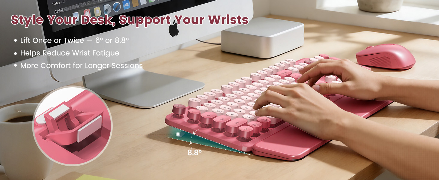 Pink retro keyboard and mouse with adjustable tilt legs for comfortable typing.