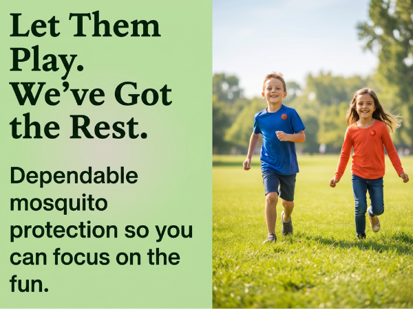 Two children running in a park wearing mosquito repellent patches for outdoor protection