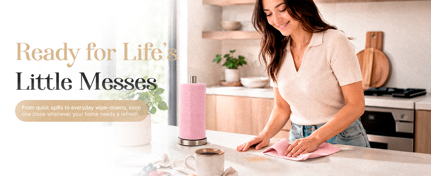 Woman wiping kitchen countertop with reusable microfiber cloth
