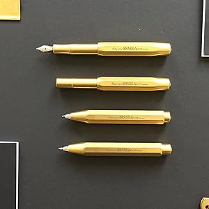 a selection of yellow and black pens and pens