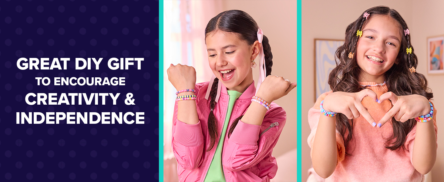 Girls posing with their finished bracelets on wrists