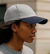 Woman wearing Unstructured Low profile Two Tone hat while getting her coffee