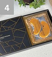 Text reads '4' on gray tag. Navy blue gift box with gold geometric line pattern opened to reveal gold metallic eye-shaped patches or appliqués with decorative borders inside.